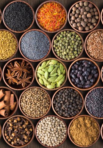 indian-spices-herbs-background-various-condiments-top-view